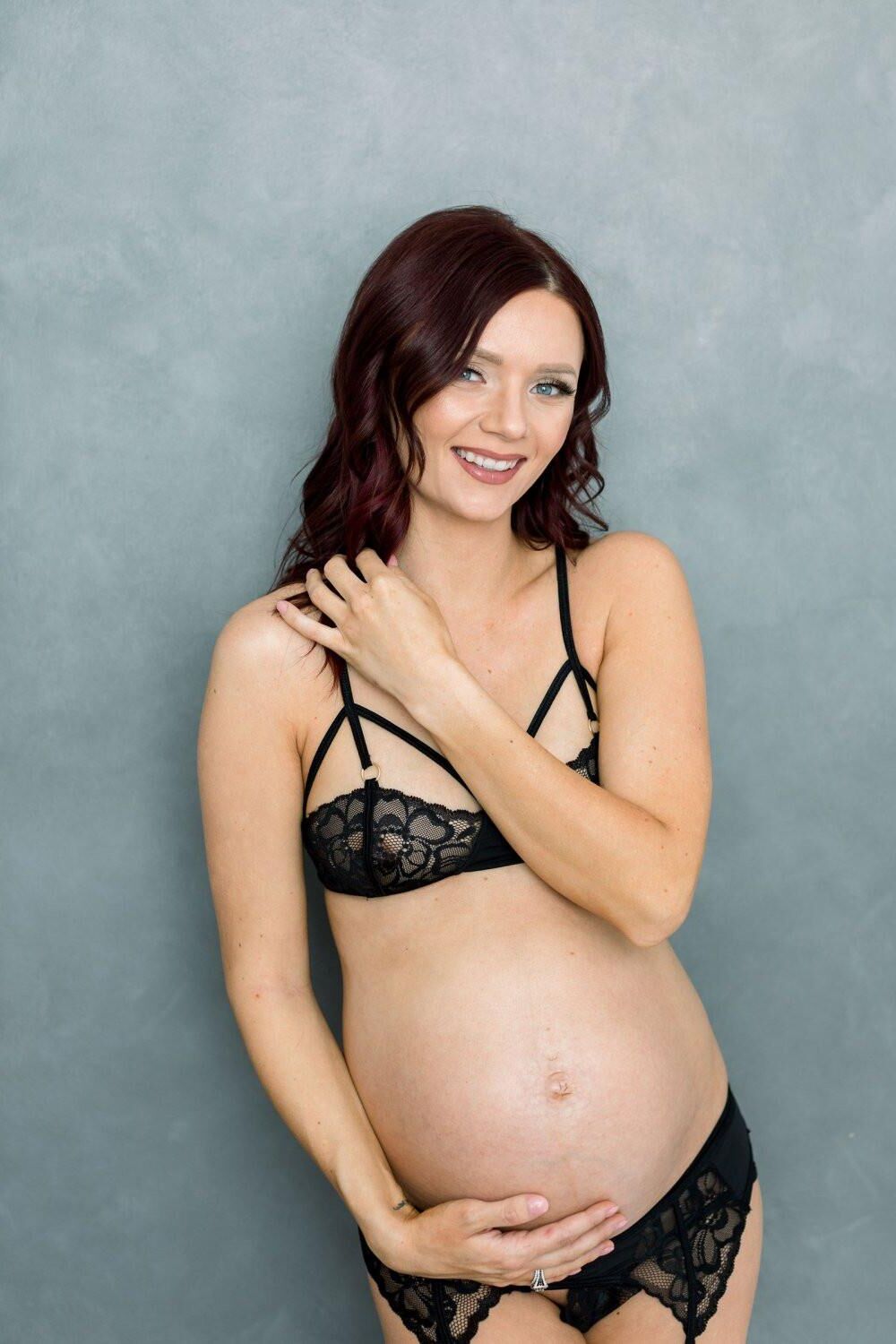 Preggo Redhead Shows her Tits