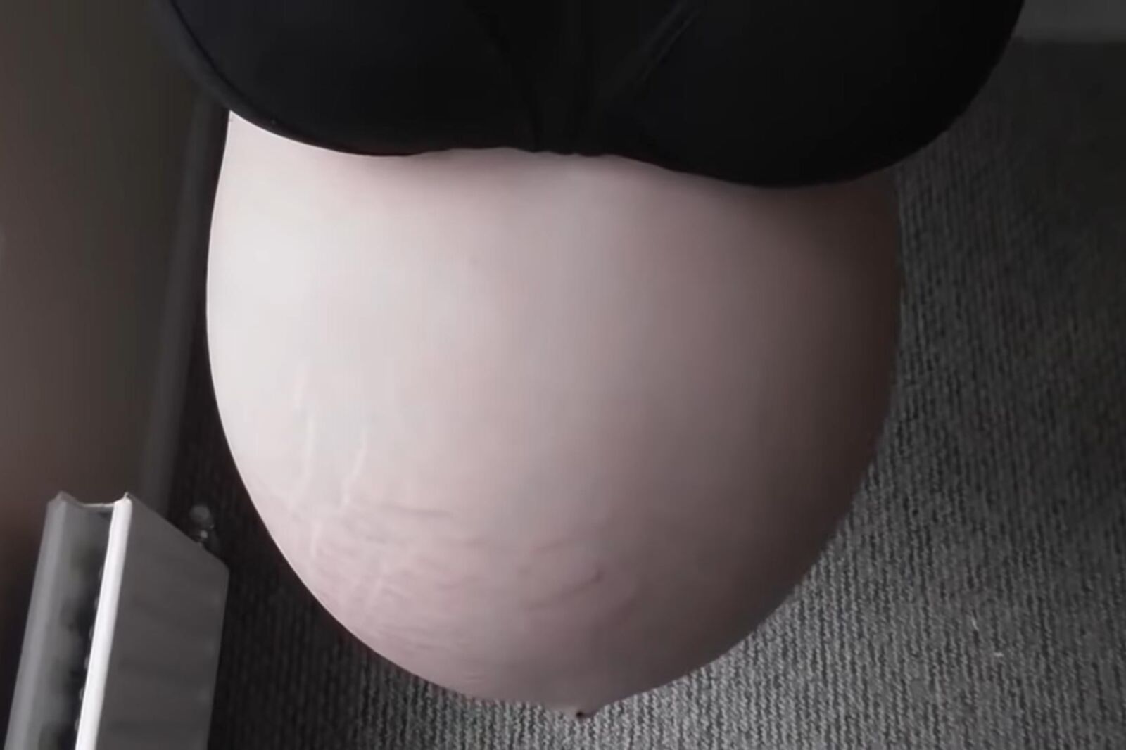 Non nude huge pregnant belly